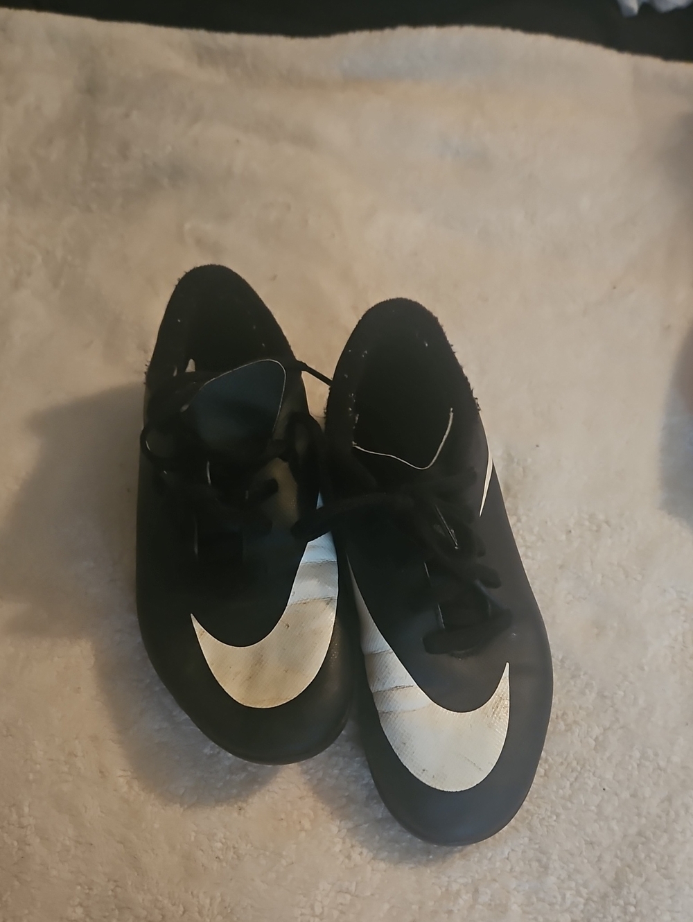 Nike Little Boys Black Athletic Cleats with White Swoosh